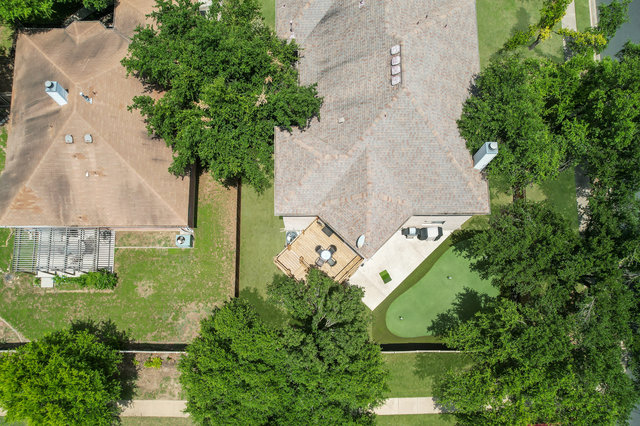1750 Star Light Circle Cedar Park, TX 78613 - Photo 36 of 40 an aerial view of a house with a yard and a large tree