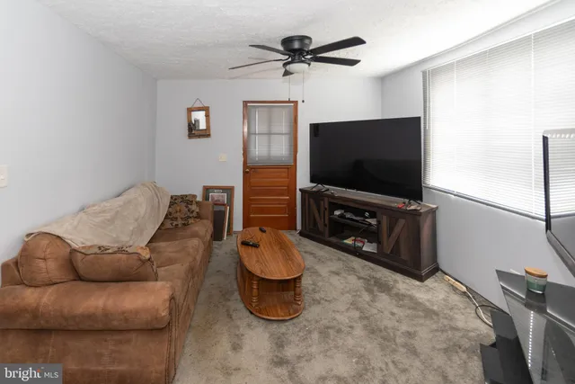 a room with gym equipment and a mirror