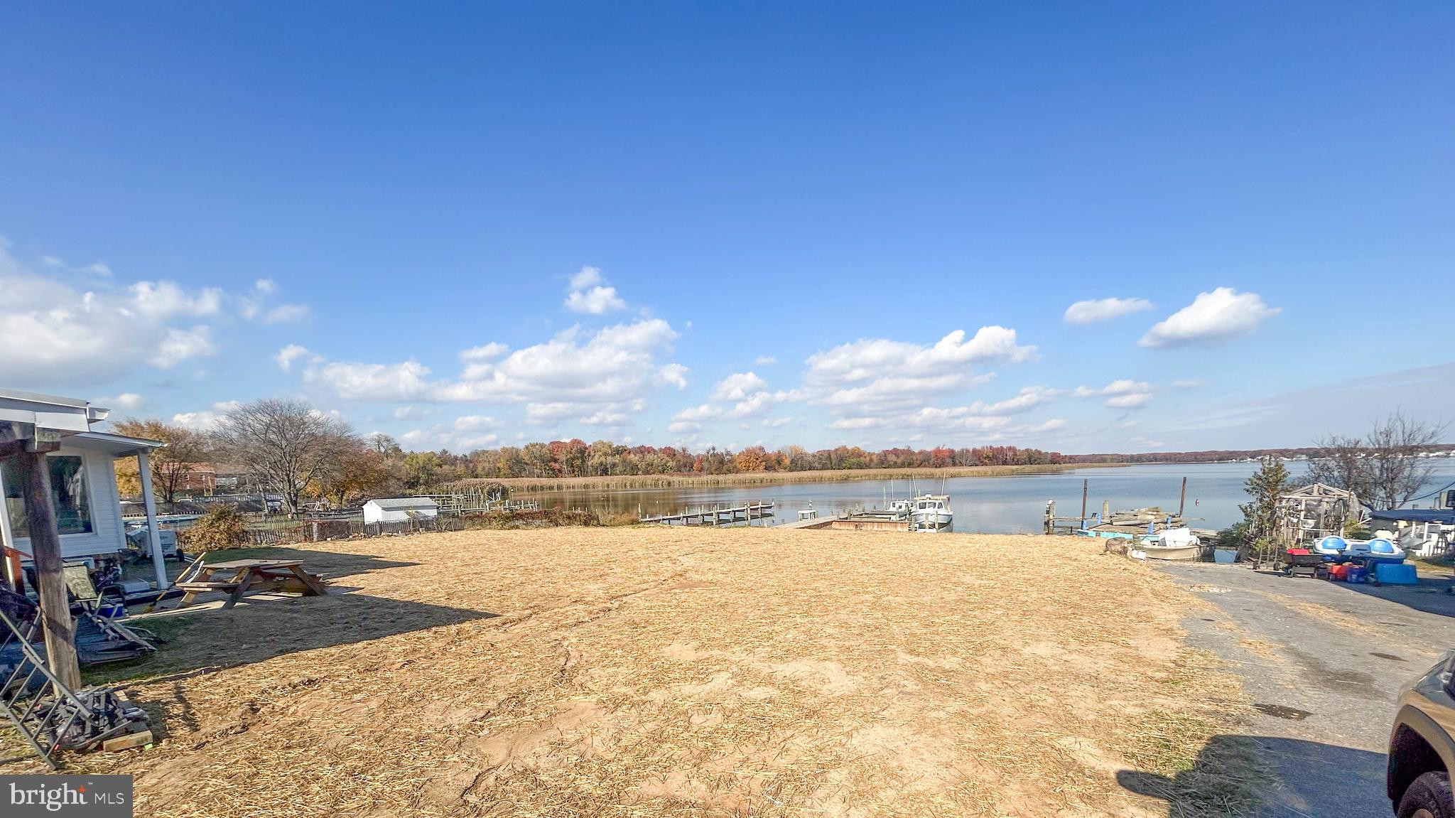6510 North Point Road Edgemere, MD 21219 - Photo 3 of 56 a view of a swimming pool and an ocean view