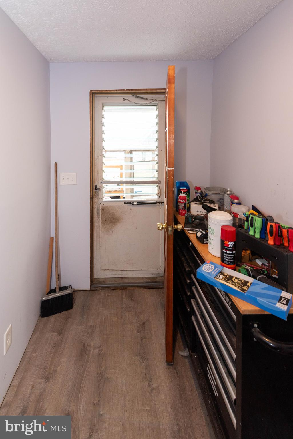 6510 North Point Road Edgemere, MD 21219 - Photo 32 of 56 a room with storage and utility