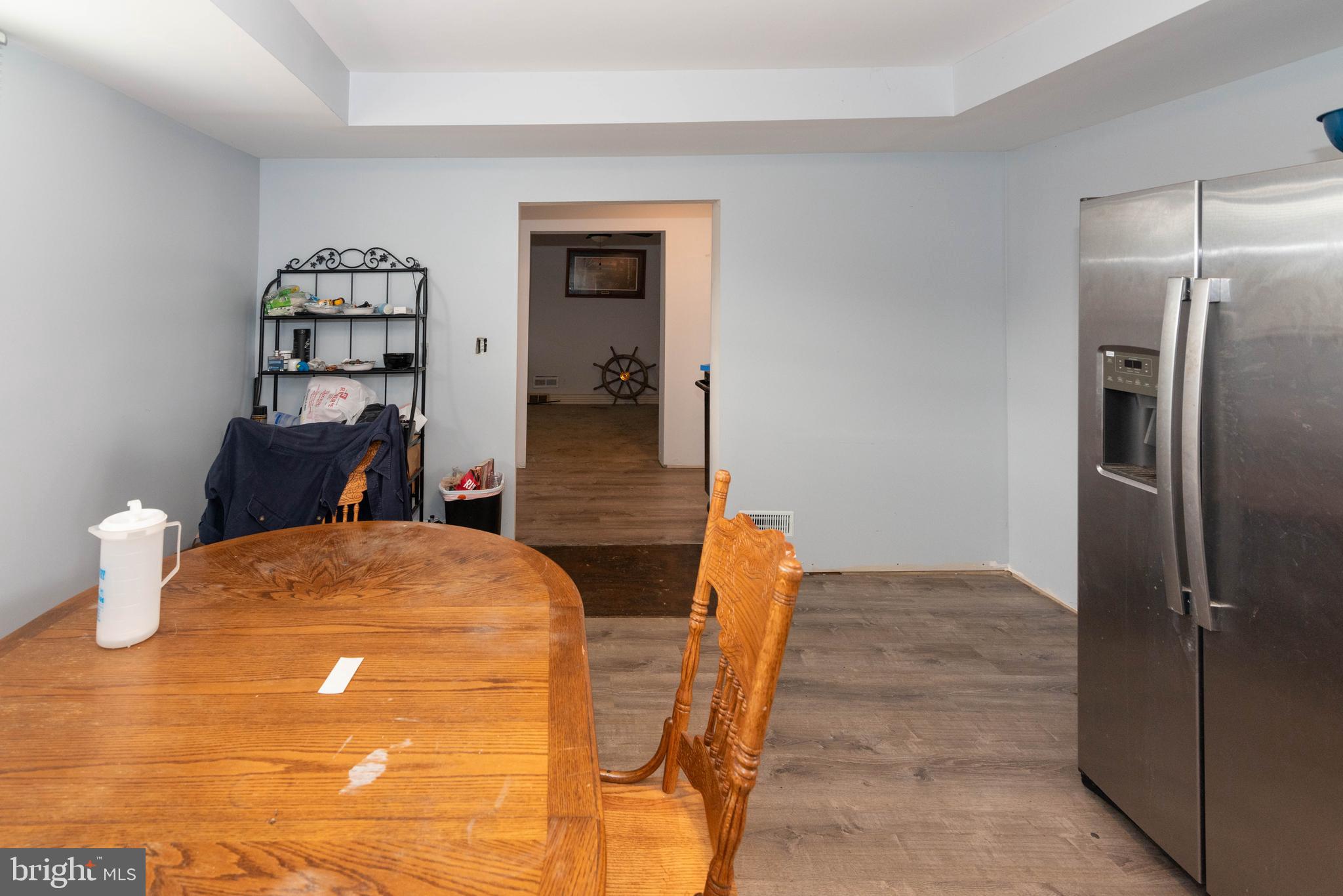 6510 North Point Road Edgemere, MD 21219 - Photo 34 of 56 a view of kitchen with furniture and wooden floor