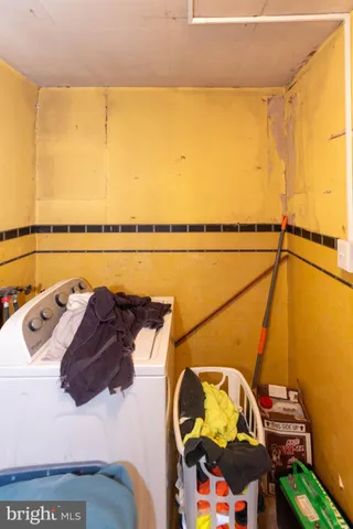 a kitchen with cabinets a sink and appliances
