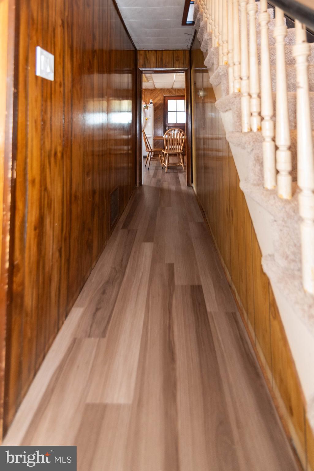 6510 North Point Road Edgemere, MD 21219 - Photo 5 of 56 a view of gallery with wooden floor