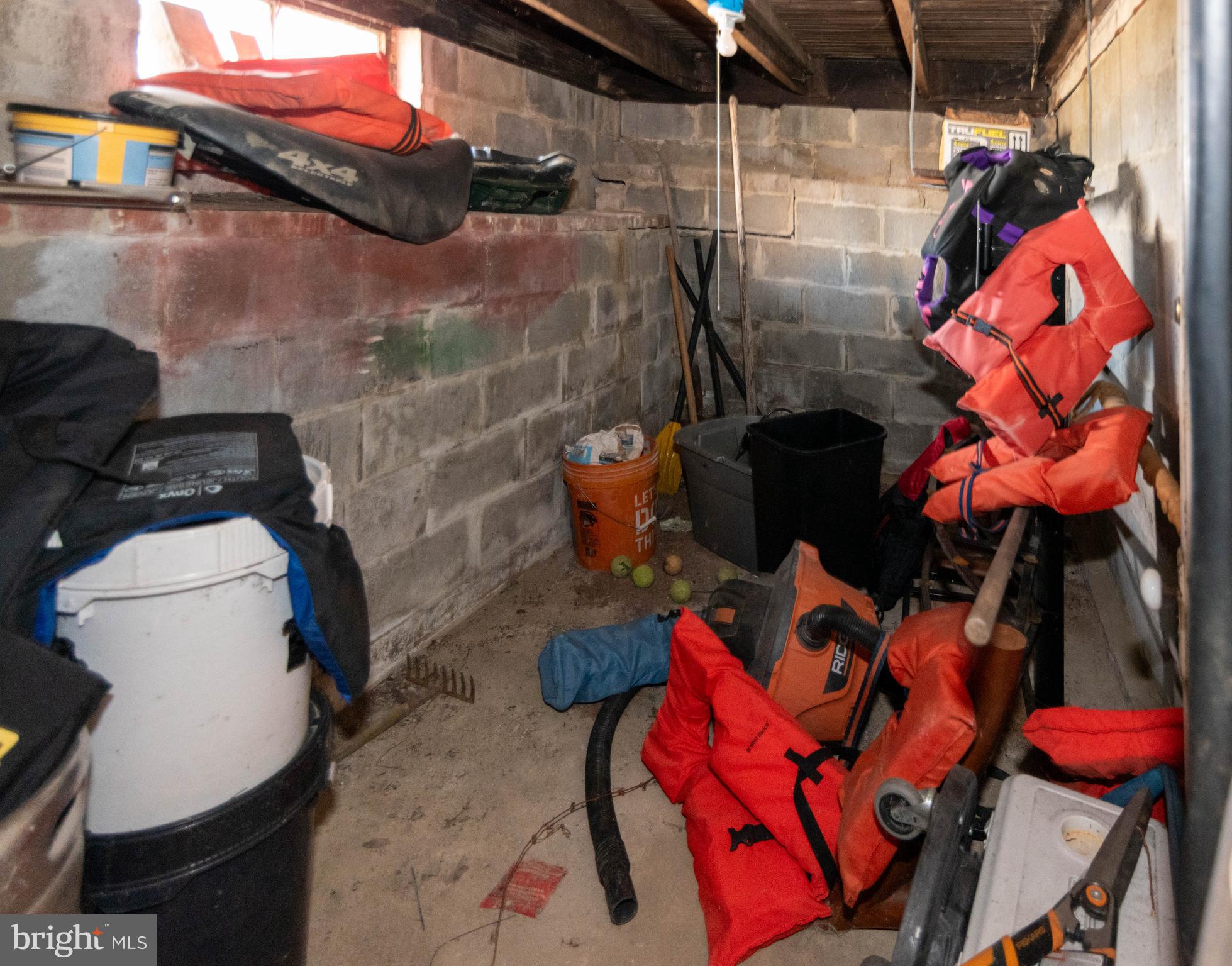 6510 North Point Road Edgemere, MD 21219 - Photo 53 of 56 a bathroom with a toilet mirror and sink
