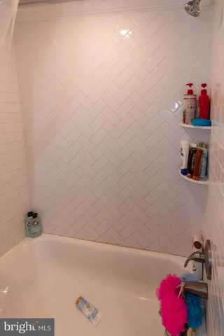 a bathroom with a bathtub