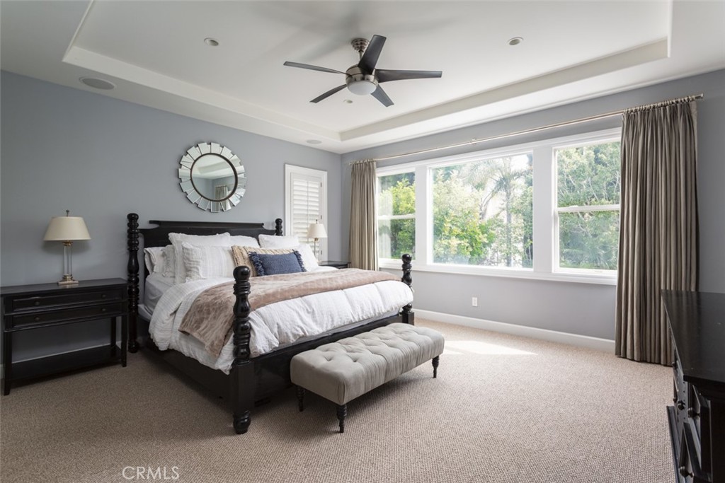 8 Madison Newport Beach, CA 92660 - Photo 17 of 34 a bedroom with bed and a large window