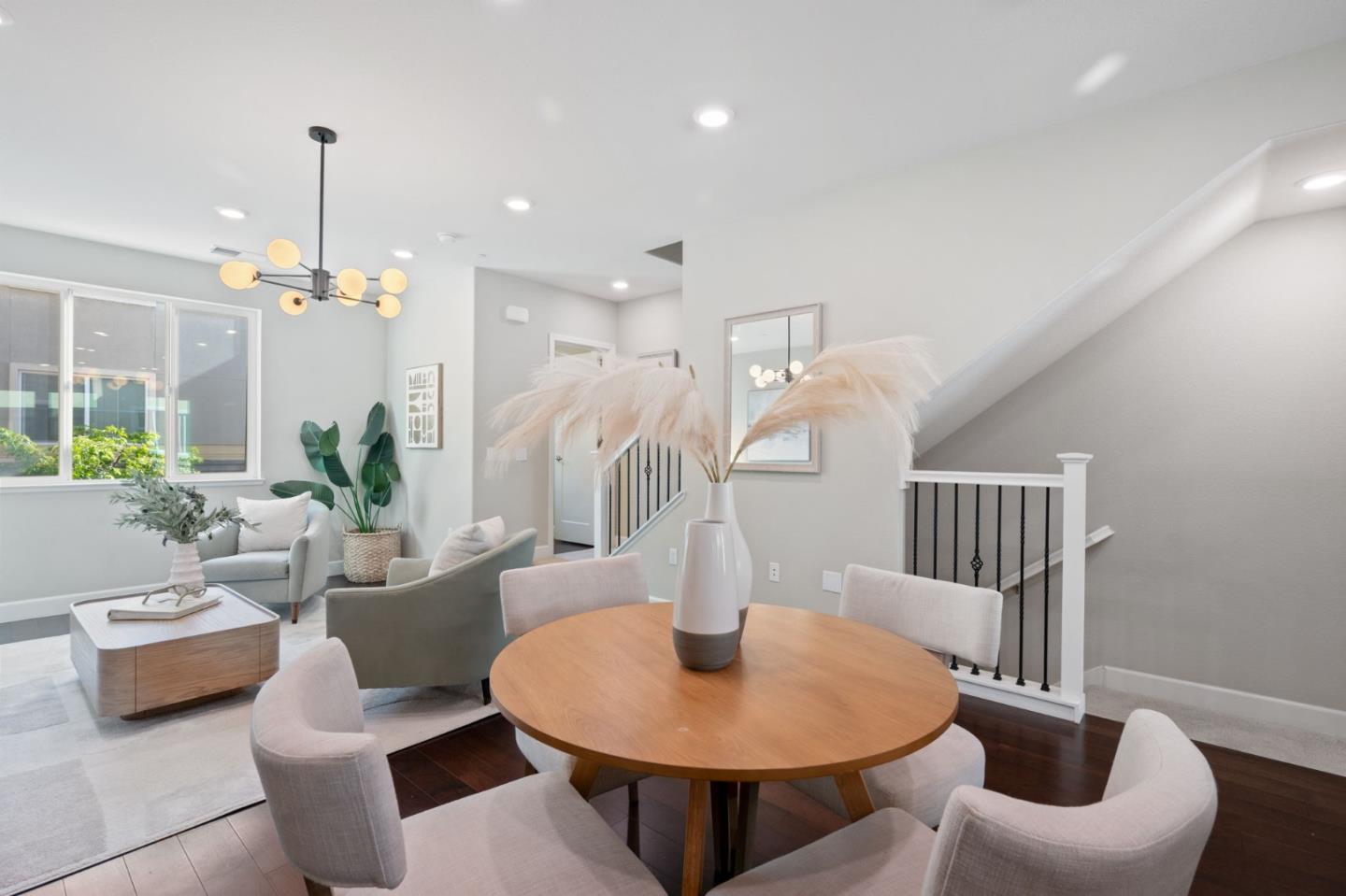 5977 Larkstone Loop San Jose, CA 95123 - Photo 14 of 63 a living room with furniture and a chandelier