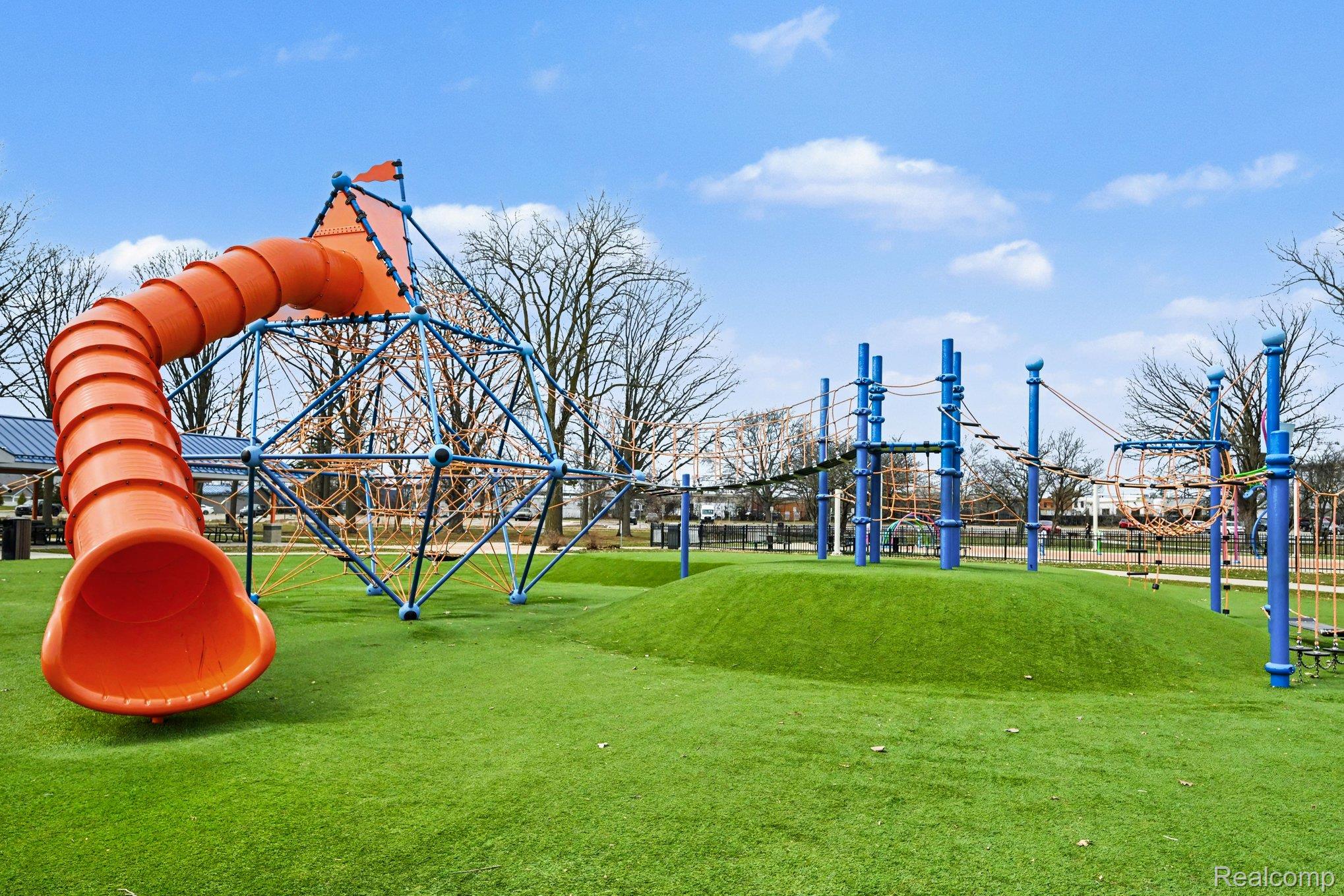 2471 Massoit Road Royal Oak, MI 48073 - Photo 3 of 49 Community playground featuring a lawn