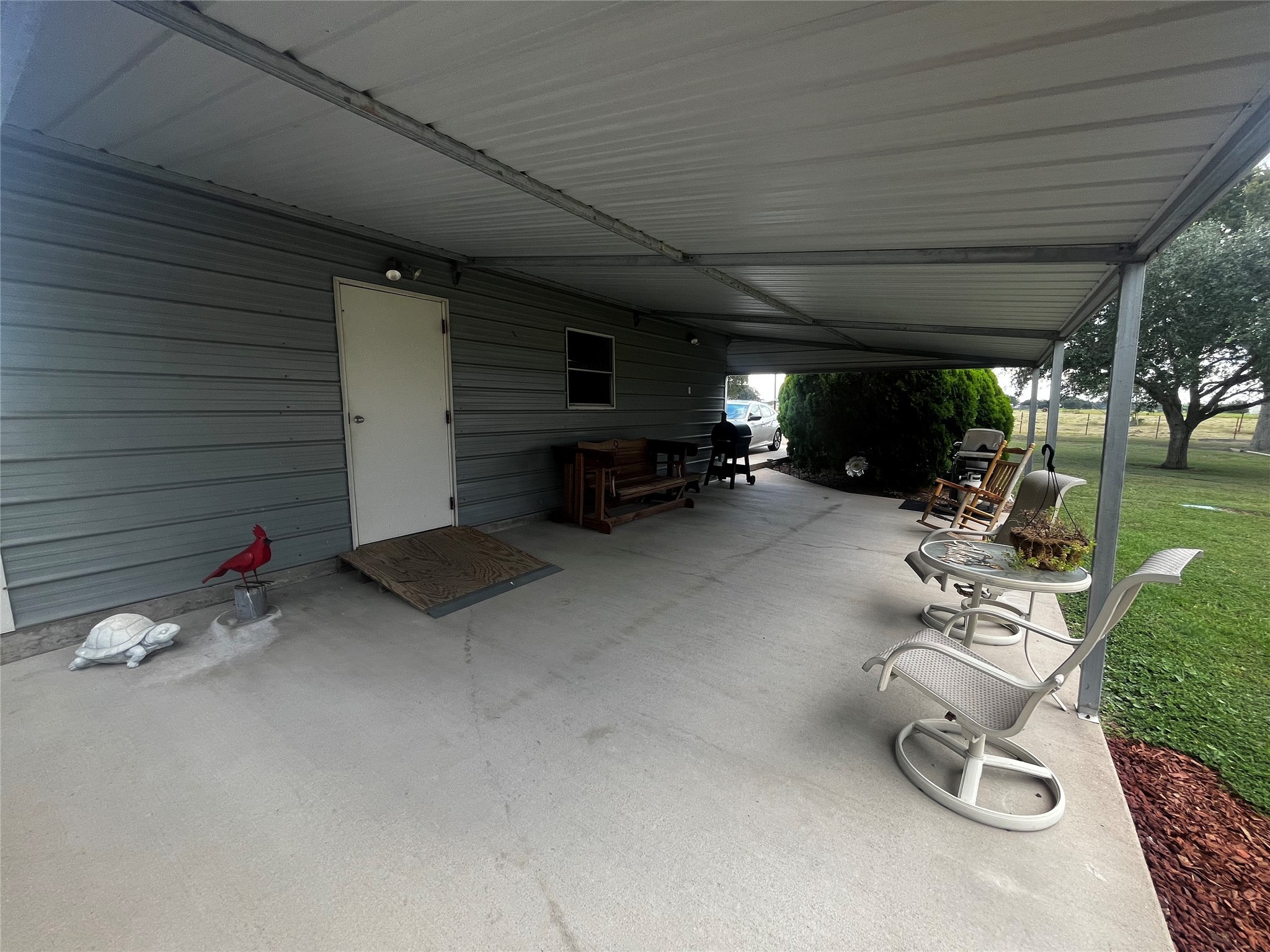 1100 Swiss Alp Hills Loop Schulenburg, TX 78956 - Photo 32 of 46 Covered Patio. Chill with a cold drink & watch the sun set.