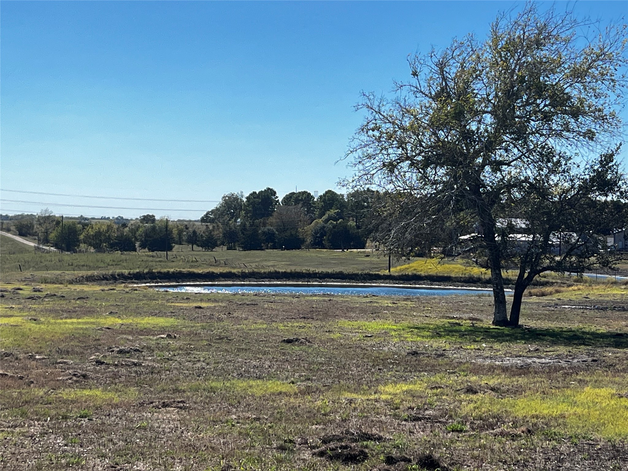1100 Swiss Alp Hills Loop Schulenburg, TX 78956 - Photo 40 of 46 a view of a lake with a big yard