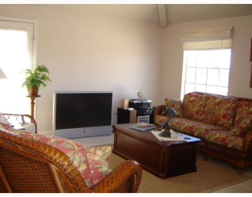 155426 Gypsy Corpus Christi, TX 78418 - Photo 4 of 9 a living room with furniture and a flat screen tv