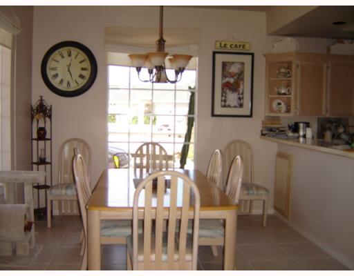 155426 Gypsy Corpus Christi, TX 78418 - Photo 8 of 9 a view of a dining room with furniture window and wooden floor