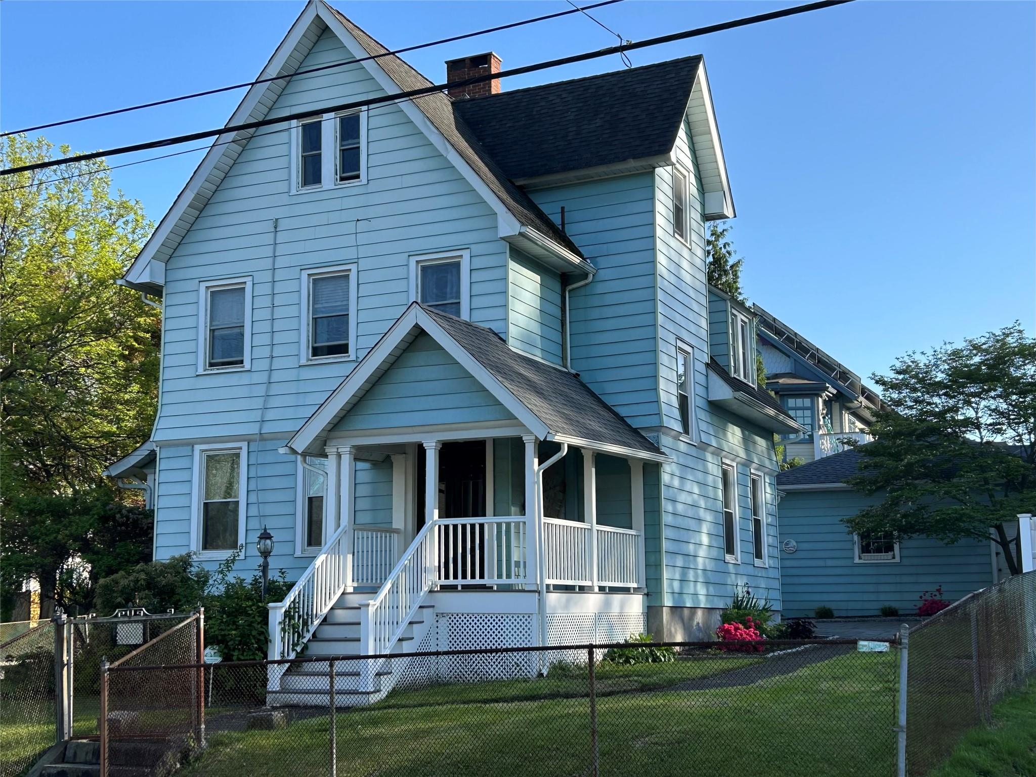 22 Herbert Street Beacon, NY 12508 - Photo 1 of 1 View of front of property with roof with shingles, covered porch, and a chimney
