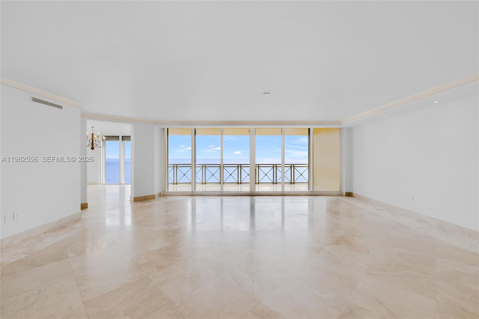430 Grand Bay Drive, Unit 902 Key Biscayne, FL 33149 - Photo 1 of 87 wooden floor in an empty room with a window