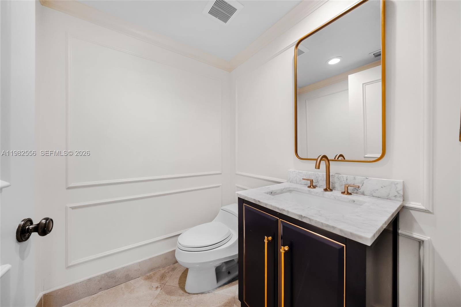 430 Grand Bay Drive, Unit 902 Key Biscayne, FL 33149 - Photo 16 of 87 a bathroom with a sink and a toilet