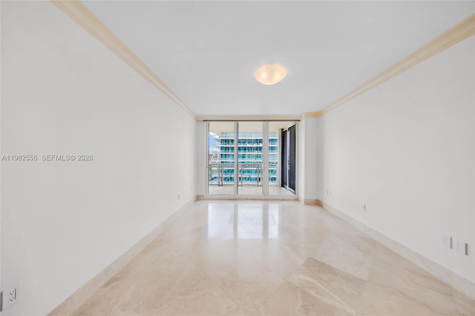 430 Grand Bay Drive, Unit 902 Key Biscayne, FL 33149 - Photo 32 of 87 a view of an empty room with a window