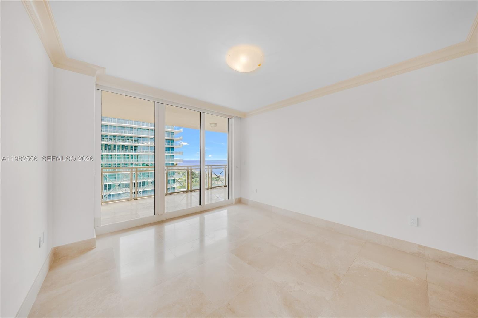 430 Grand Bay Drive, Unit 902 Key Biscayne, FL 33149 - Photo 41 of 87 a view of an empty room with a window