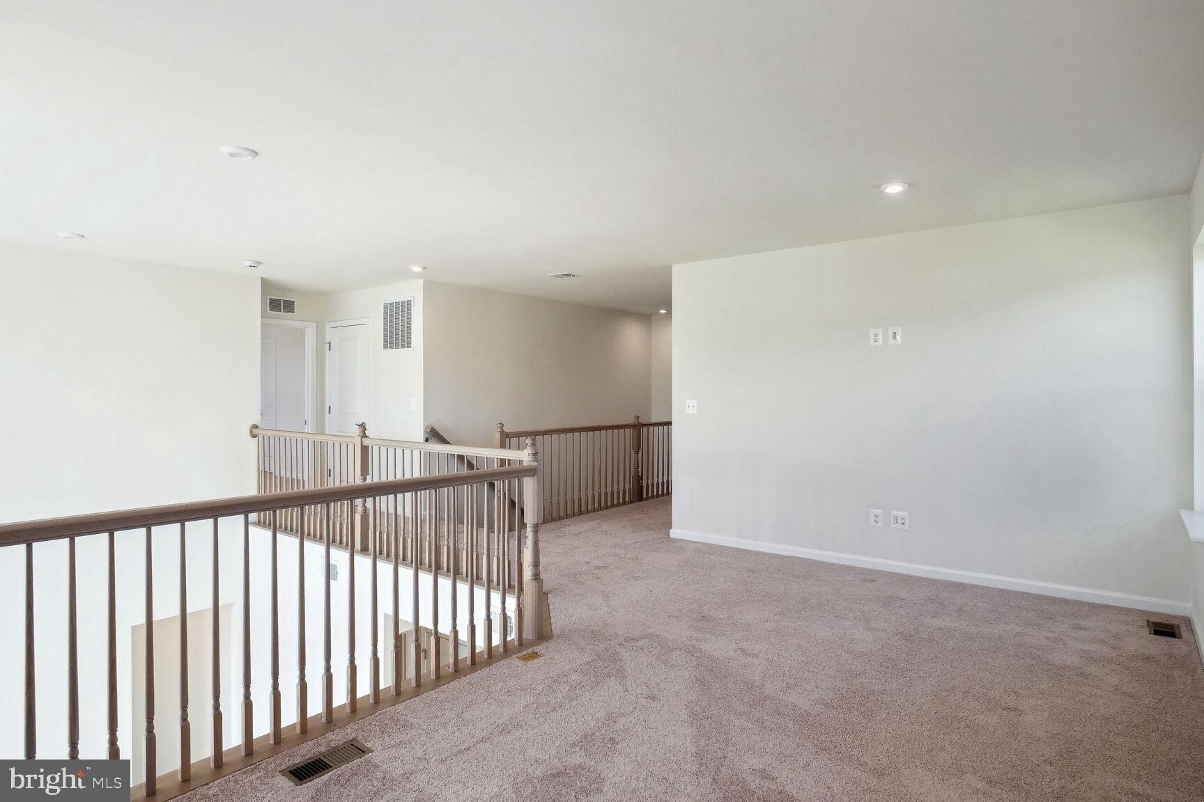 25017 Cypress Court Lewes, DE 19958 - Photo 5 of 14 a view of a hallway
