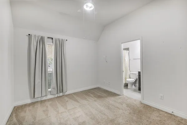 an empty room with a natural light