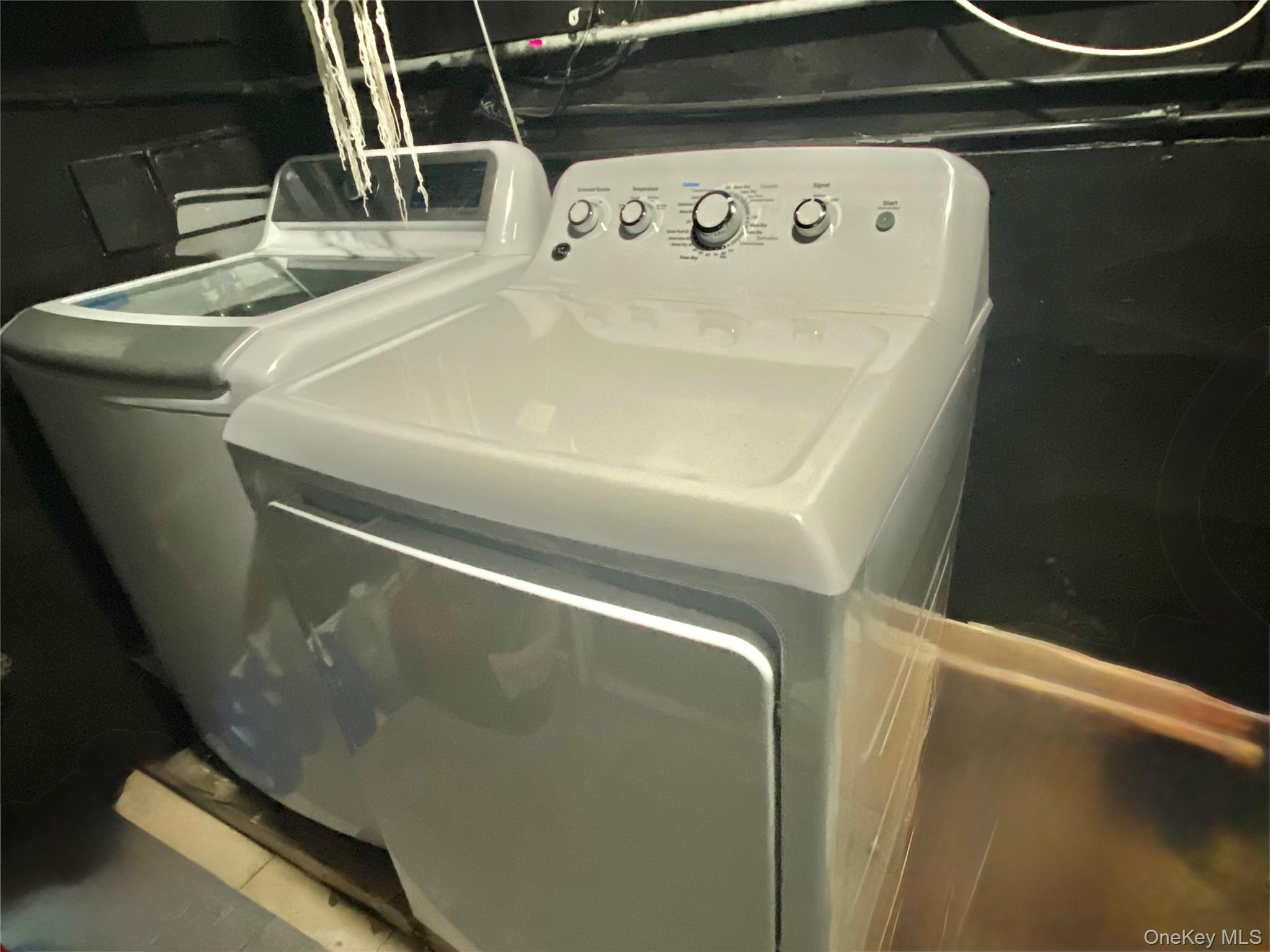107 Baker Hill Road Great Neck, NY 11023 - Photo 20 of 29 a close view of washer and dryer