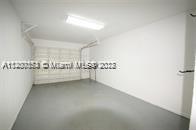 13936 Southwest 46th Terrace, Unit B Miami, FL 33175 - Photo 10 of 11 a view of a room with an empty space