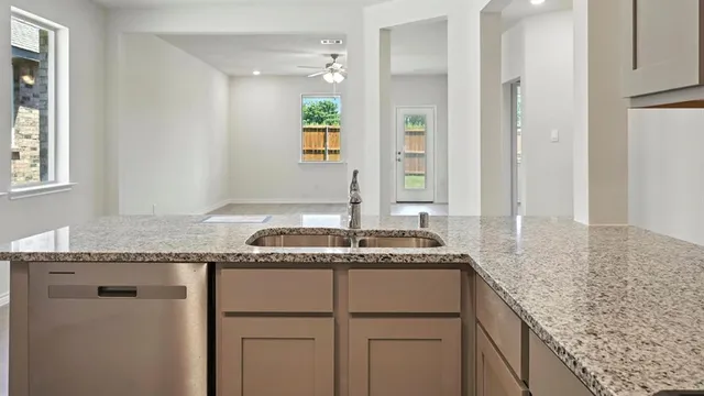 a view of entryway with wooden floor and stairs