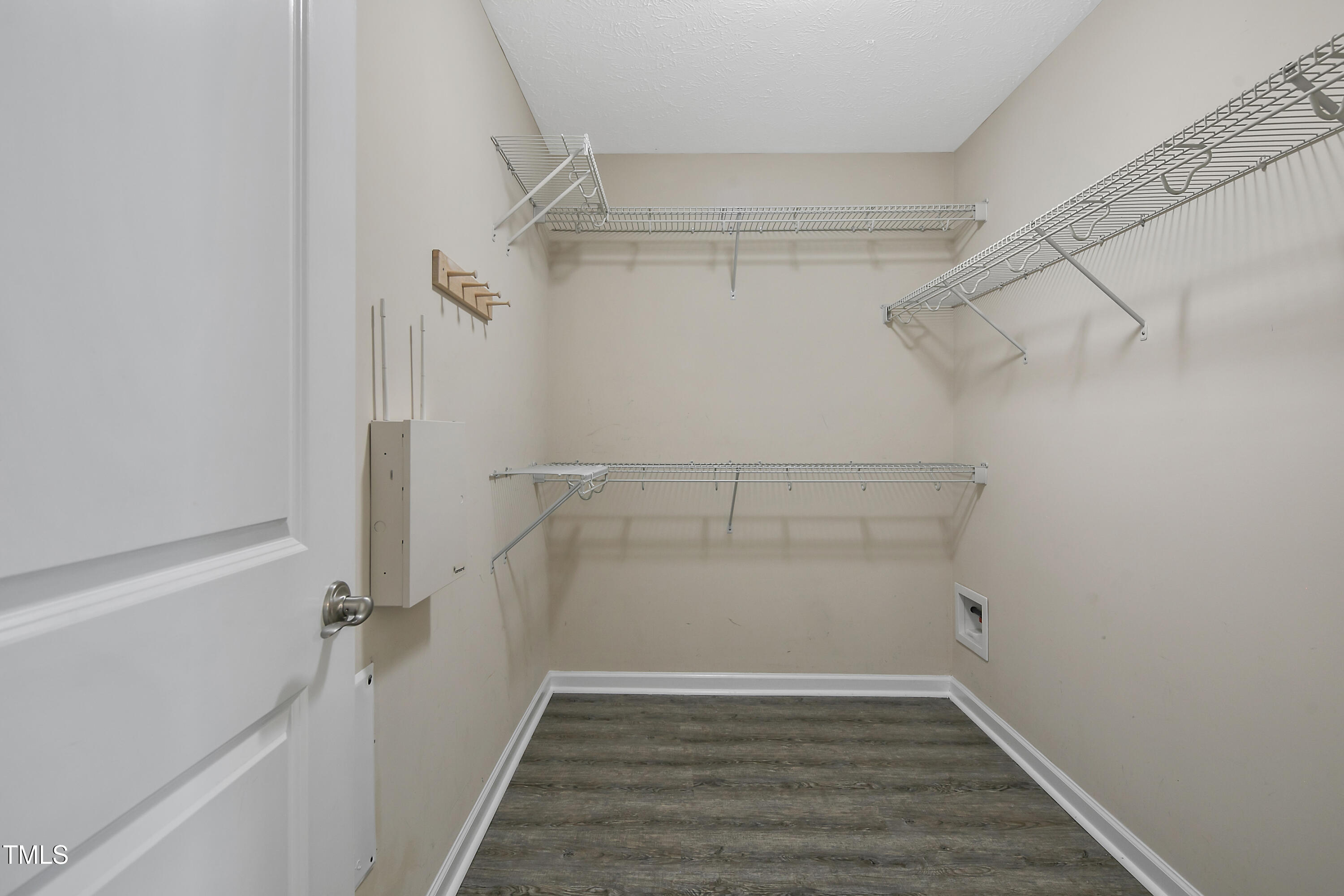 949 Raspberry Road Stedman, NC 28391 - Photo 18 of 31 a view of a room with racks on the wall