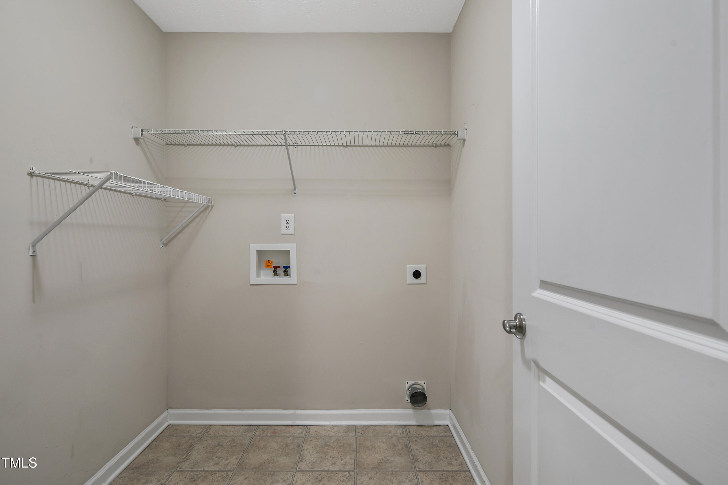 949 Raspberry Road Stedman, NC 28391 - Photo 21 of 31 a view of a room with racks on the wall