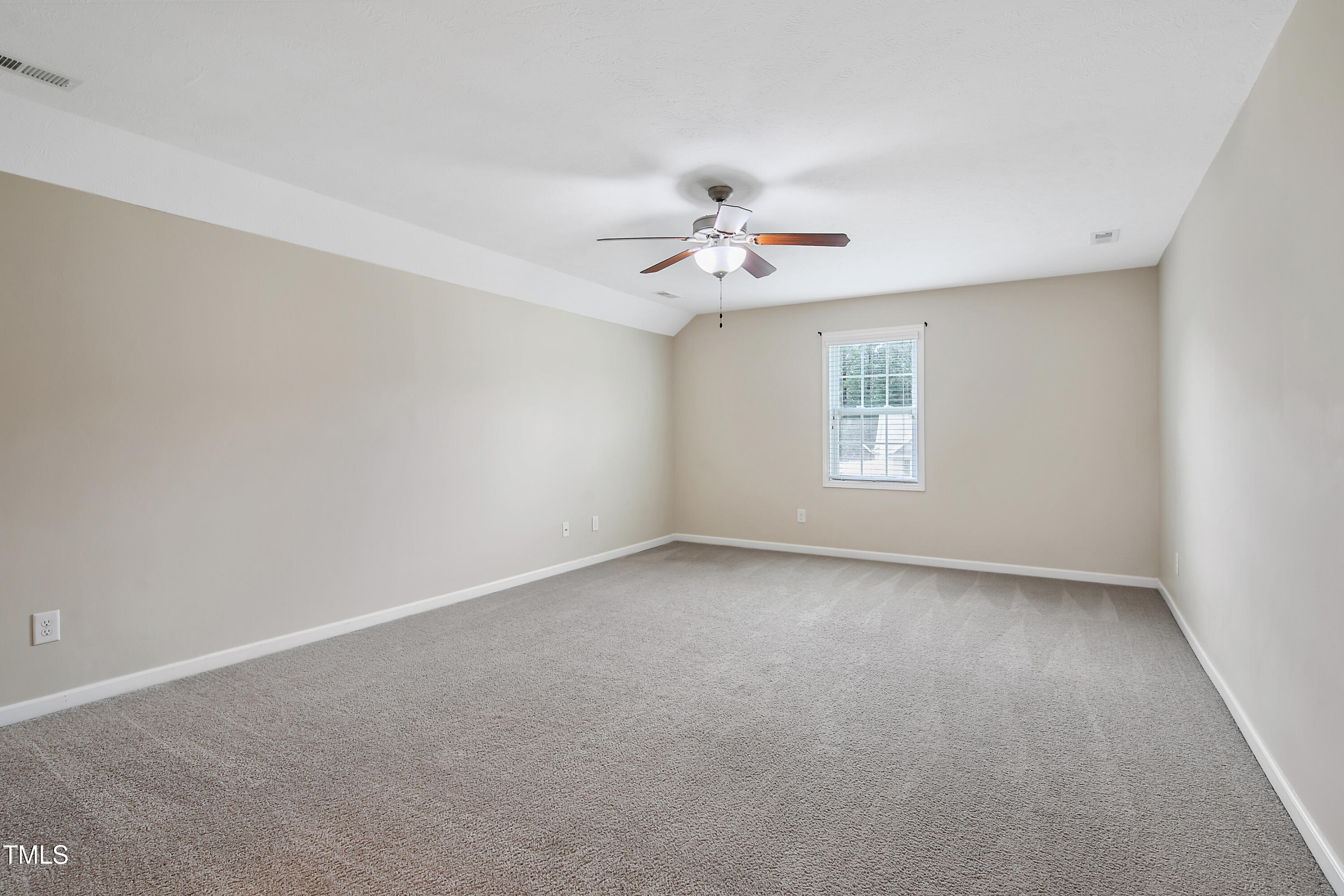 949 Raspberry Road Stedman, NC 28391 - Photo 22 of 31 a view of an empty room with a window