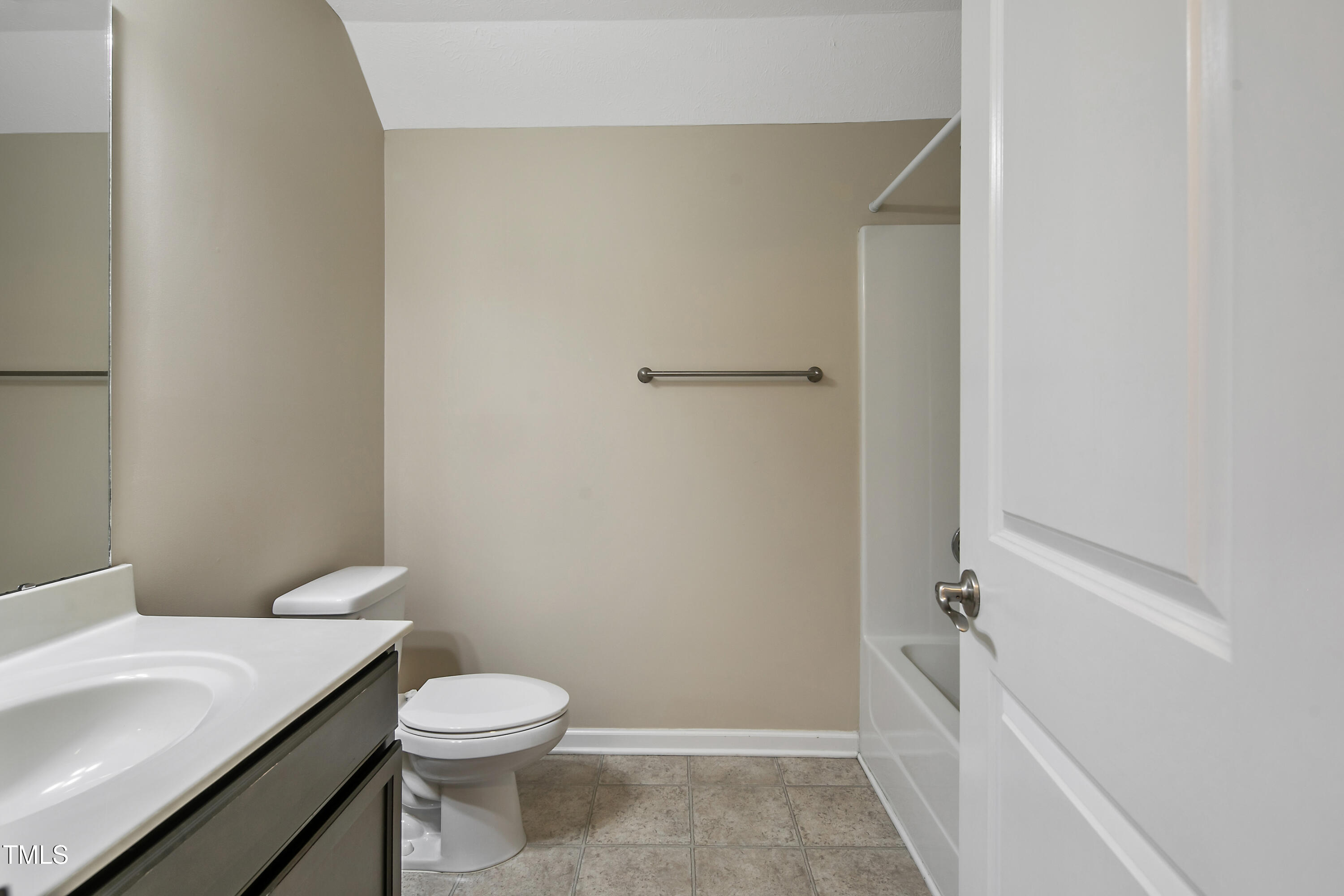 949 Raspberry Road Stedman, NC 28391 - Photo 24 of 31 a bathroom with a sink a toilet and shower