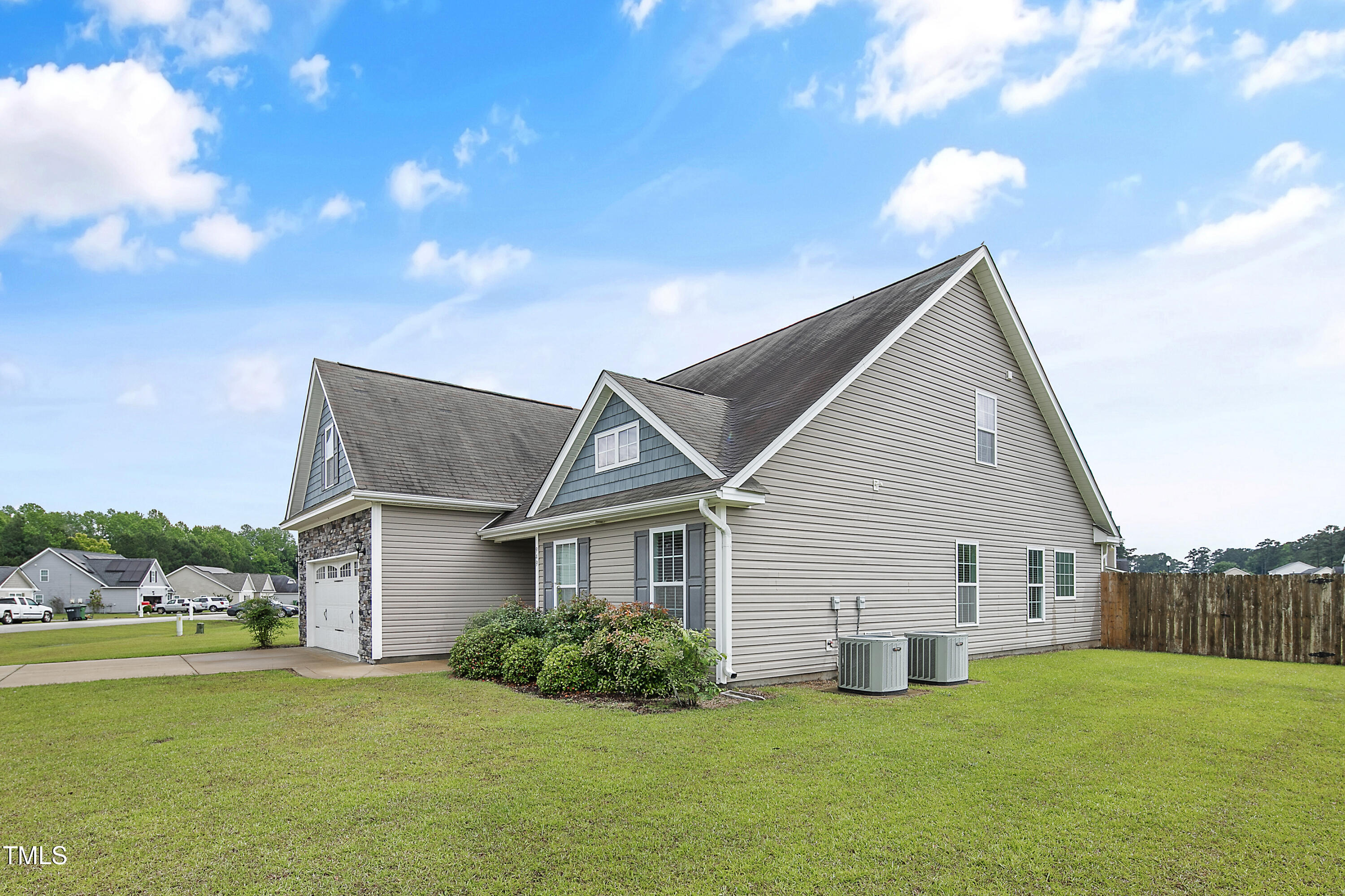 949 Raspberry Road Stedman, NC 28391 - Photo 29 of 31 a view of a house with backyard and garden