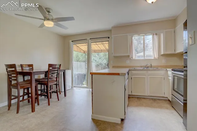 a kitchen that has a cabinets counter space and appliances