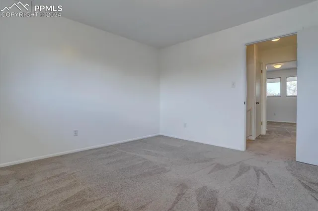a bathroom with a sink and vanity