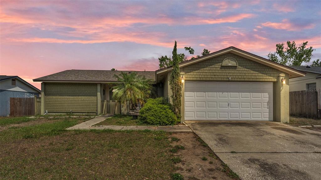 2707 Manor Hill Drive Brandon, FL 33511 - Photo 1 of 1 a front view of a house with a garage