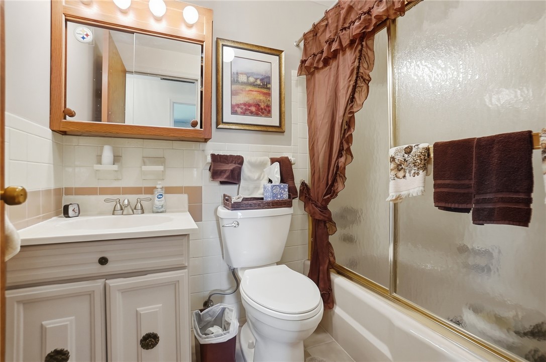 6225 Possum Run Road Bellbrook, OH 45305 - Photo 25 of 33 This functional bathroom features practical fixtures and a classic tub-shower combination.