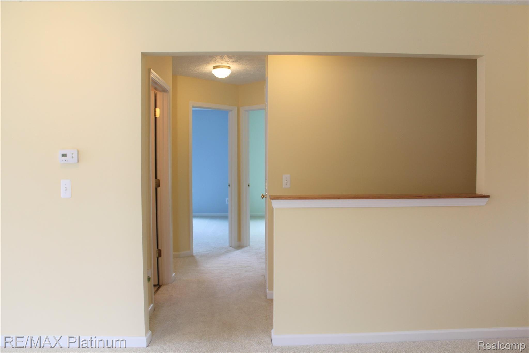 2678 Golf Club Road Howell, MI 48843 - Photo 24 of 46 hall to bedrooms