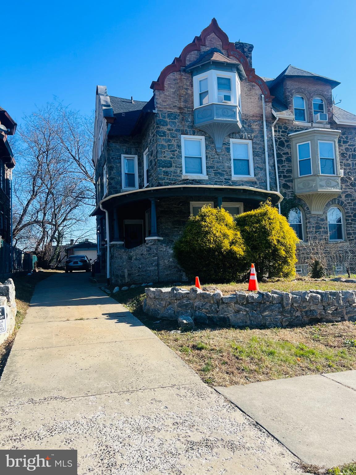 817 North 63rd Street, Unit 3 Philadelphia, PA 19151 - Photo 2 of 10 a front view of a house with a yard