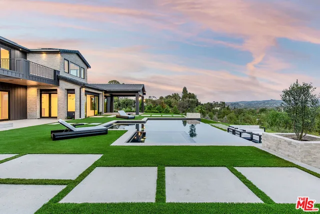a view of outdoor space yard deck patio and fire pit