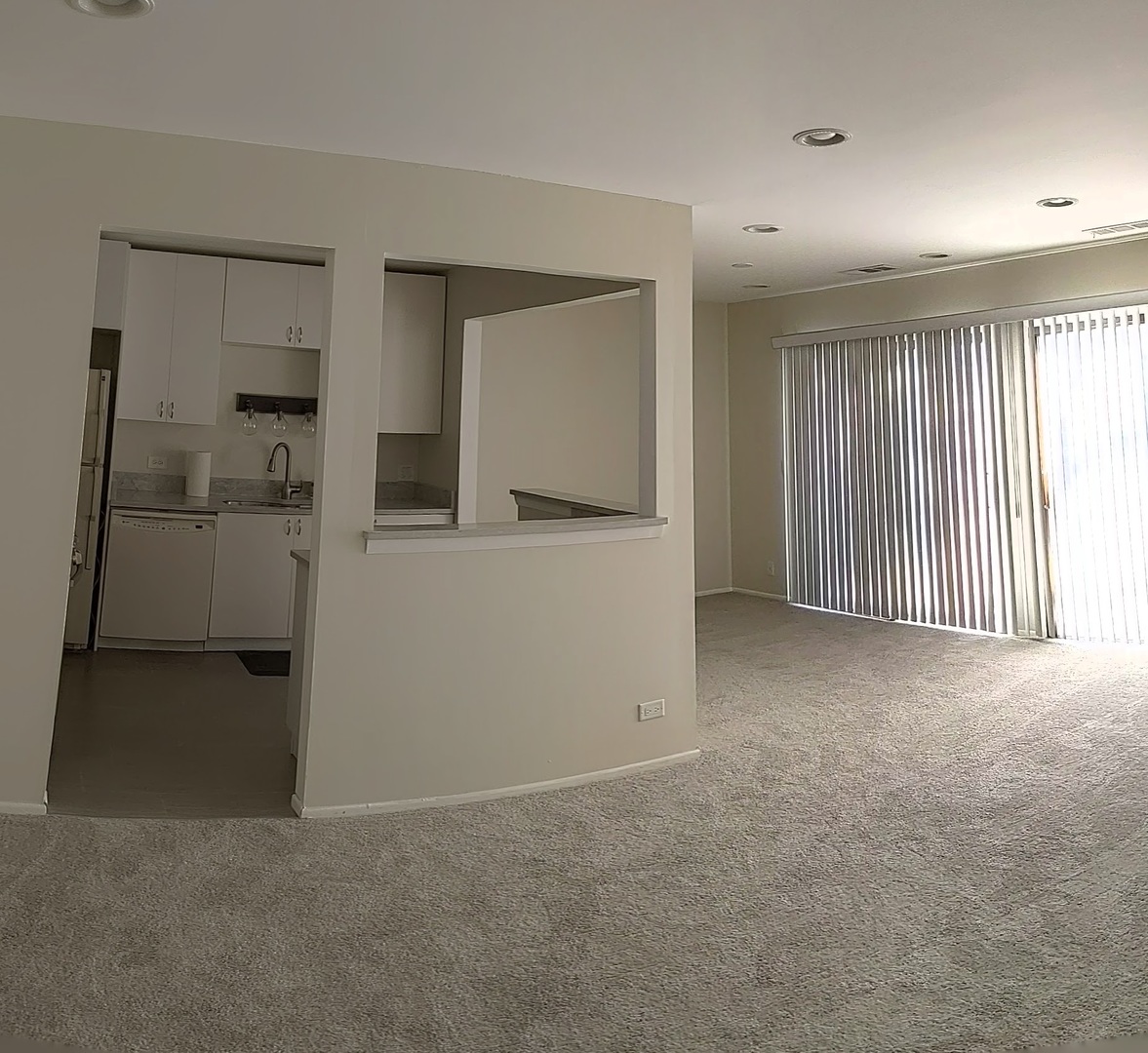 70 Margate Court, Unit C2 Schaumburg, IL 60193 - Photo 15 of 35 an empty room with a cabinet and mirror