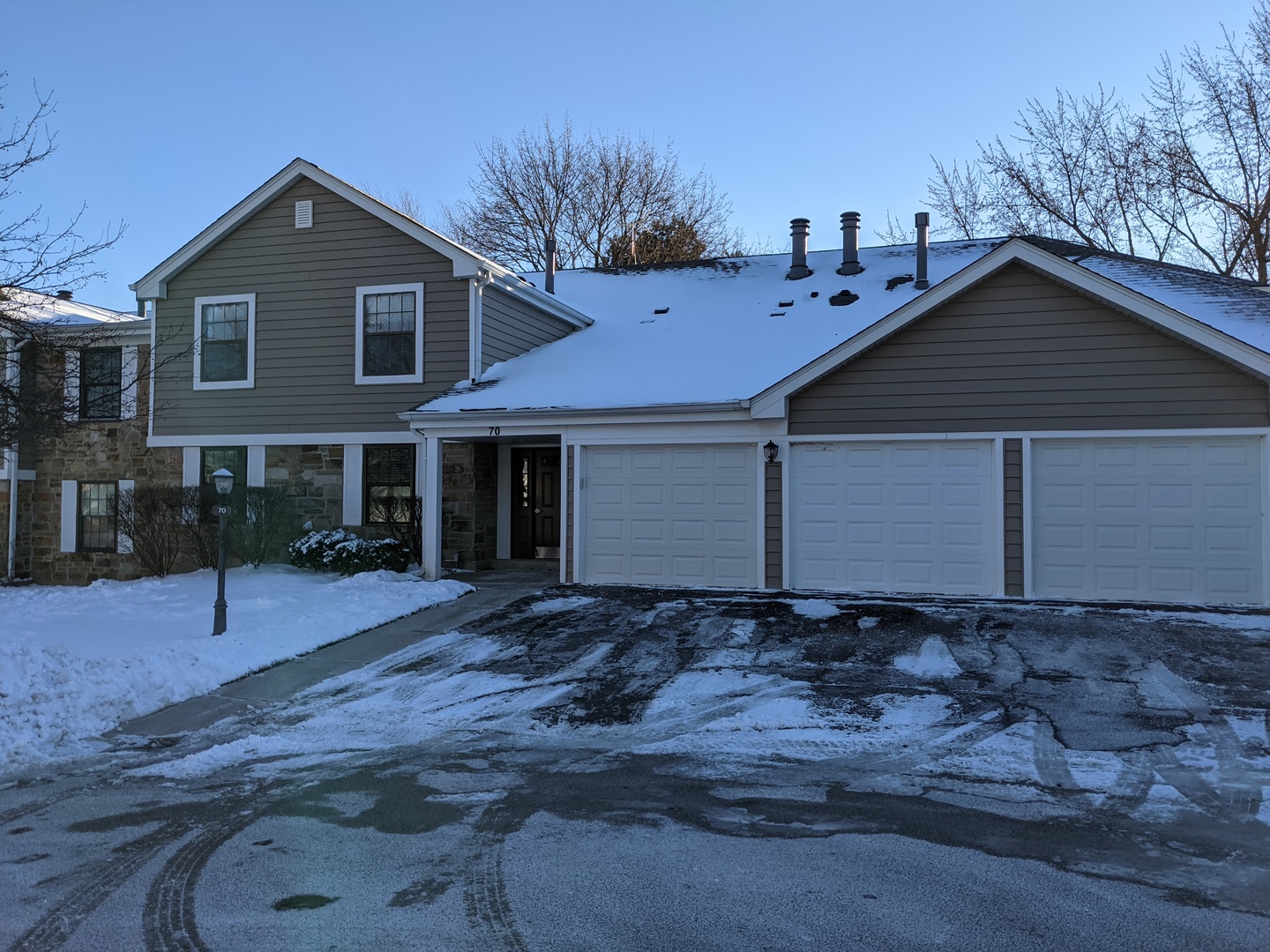 70 Margate Court, Unit C2 Schaumburg, IL 60193 - Photo 2 of 35 a front view of a house with a yard