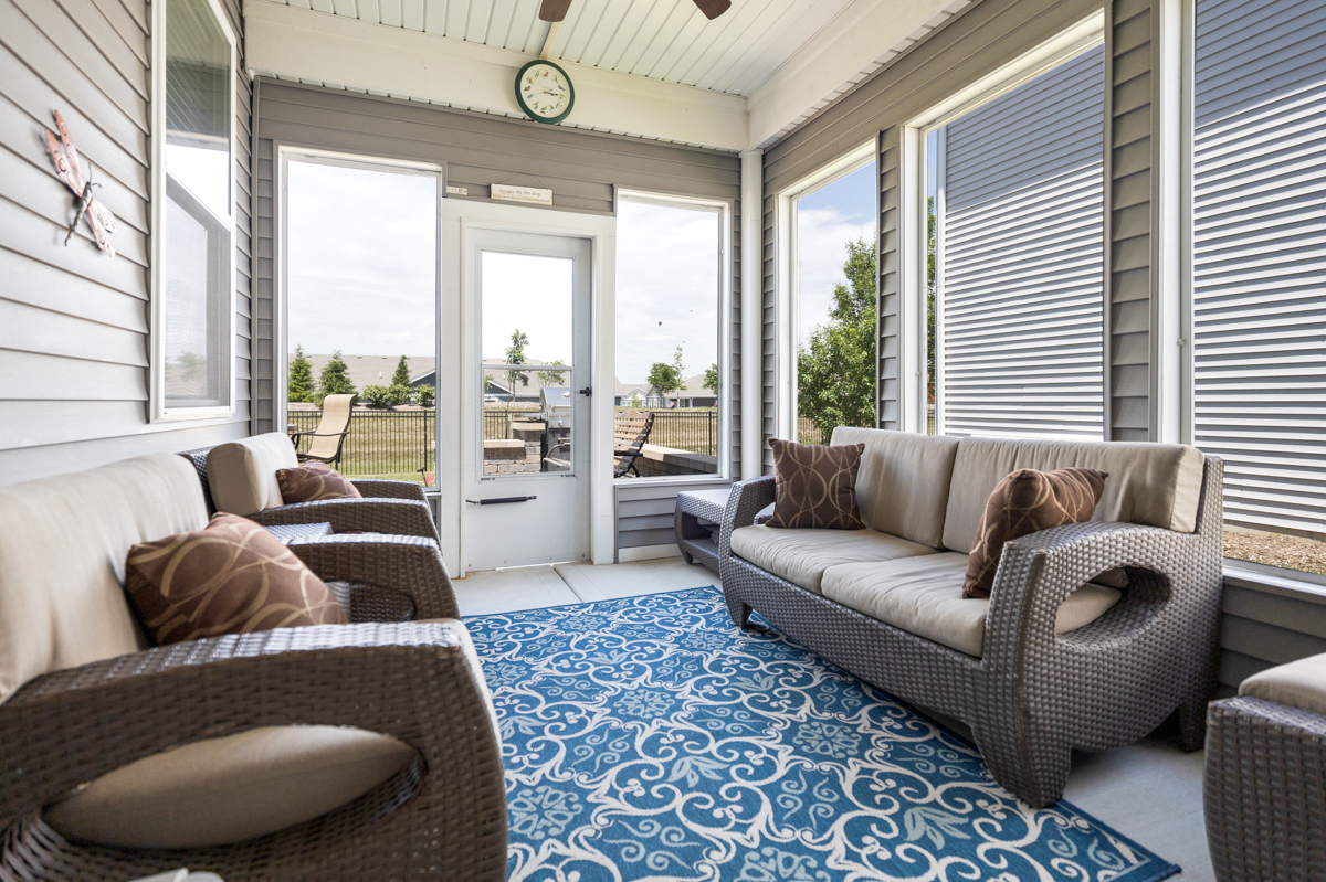 1150 Americana Avenue Pingree Grove, IL 60140 - Photo 19 of 30 a living room with furniture and a large window