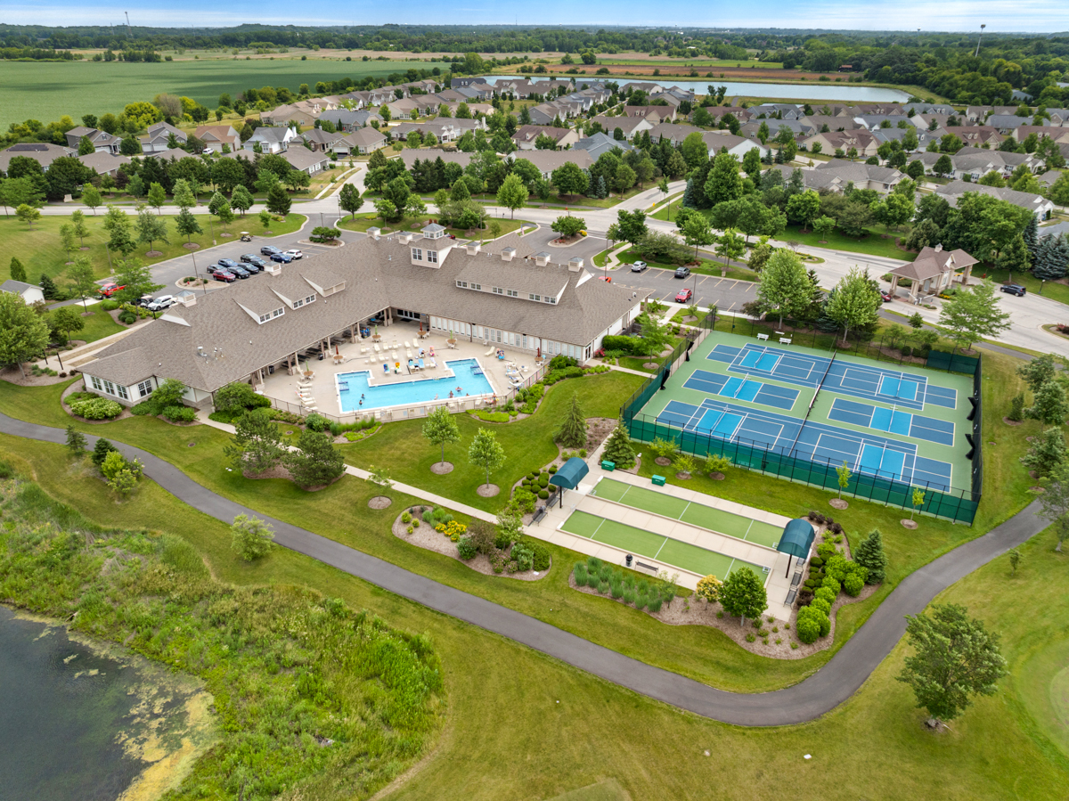 1150 Americana Avenue Pingree Grove, IL 60140 - Photo 30 of 30 an aerial view of a resort with swimming pool and ocean view