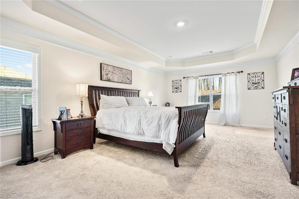 7545 Rambling Vale Dawsonville, GA 30534 - Photo 28 of 46 a bedroom with a bed and window