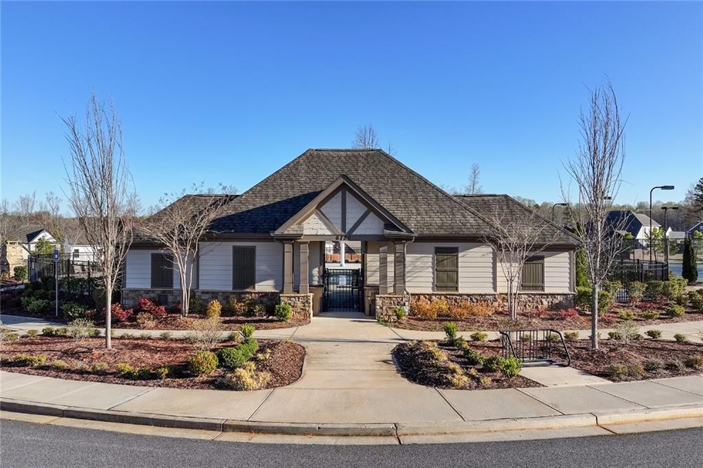 7545 Rambling Vale Dawsonville, GA 30534 - Photo 42 of 46 a front view of a house with garden