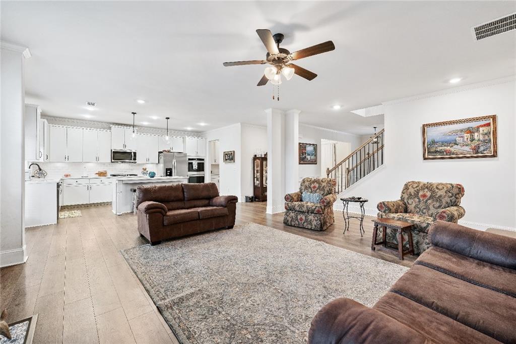 7545 Rambling Vale Dawsonville, GA 30534 - Photo 8 of 46 a living room with furniture and kitchen view