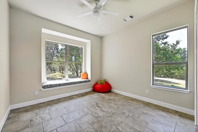 a view of a room with window and closet