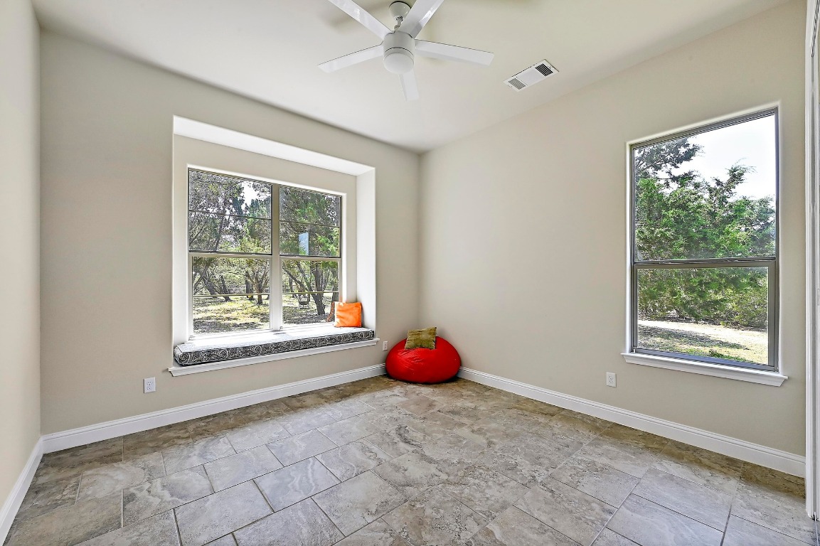 221 Tower Road Georgetown, TX 78628 - Photo 19 of 40 a view of a room with window and closet
