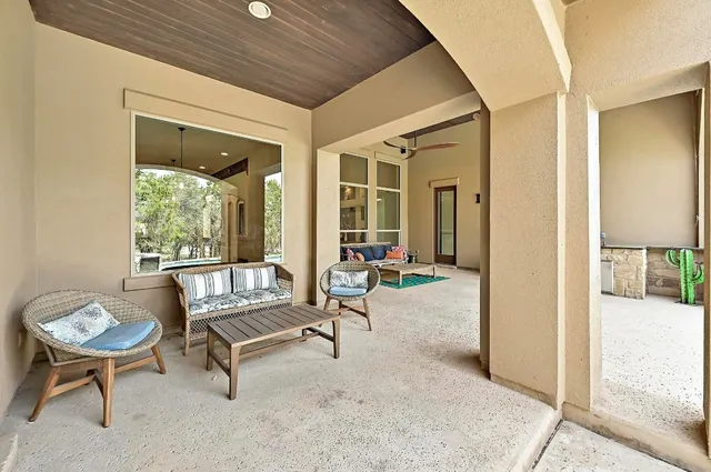 a living room with furniture and a table