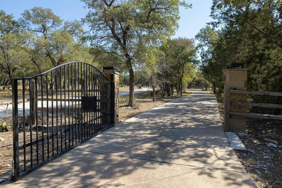 221 Tower Road Georgetown, TX 78628 - Photo 3 of 40 a view of street with wooden fence