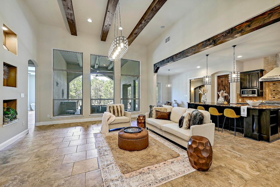 221 Tower Road Georgetown, TX 78628 - Photo 9 of 40 a living room with furniture and a large window